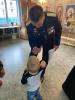 Фото героя СВО с малышом.